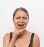 Mujer con dolor de muela