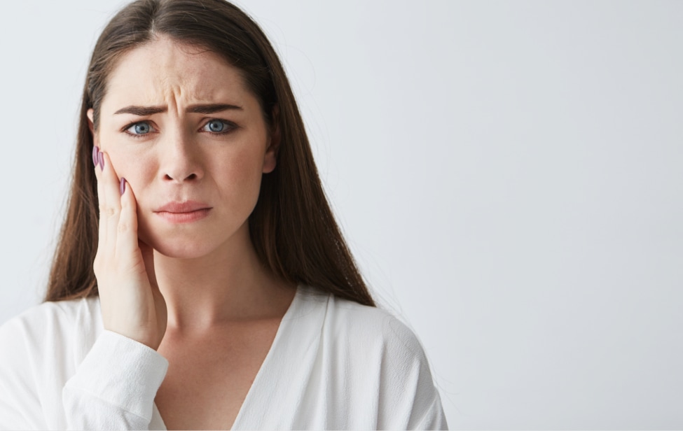 Mujer con dolor de muela